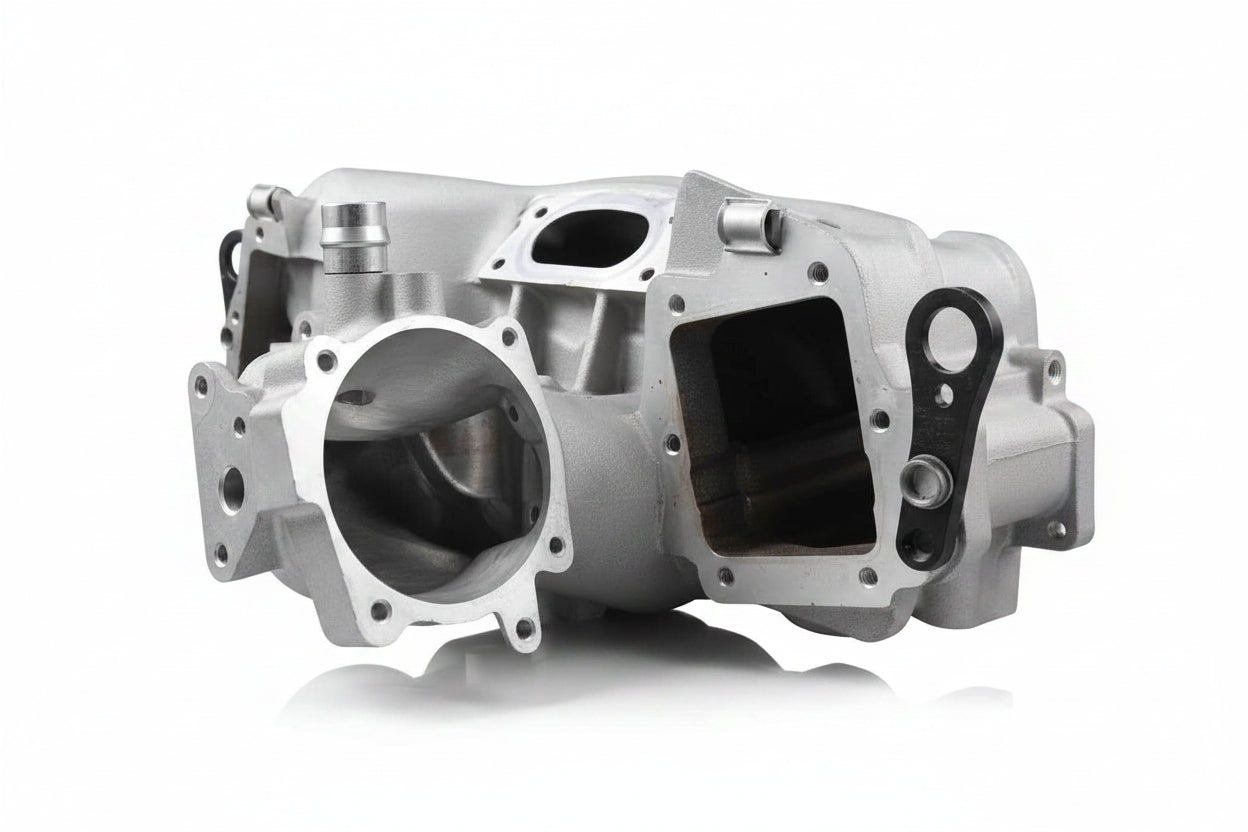 Vorsprung Autowerk Artus-Sturm Supercharger Port installed on a car engine for enhanced performance and airflow.