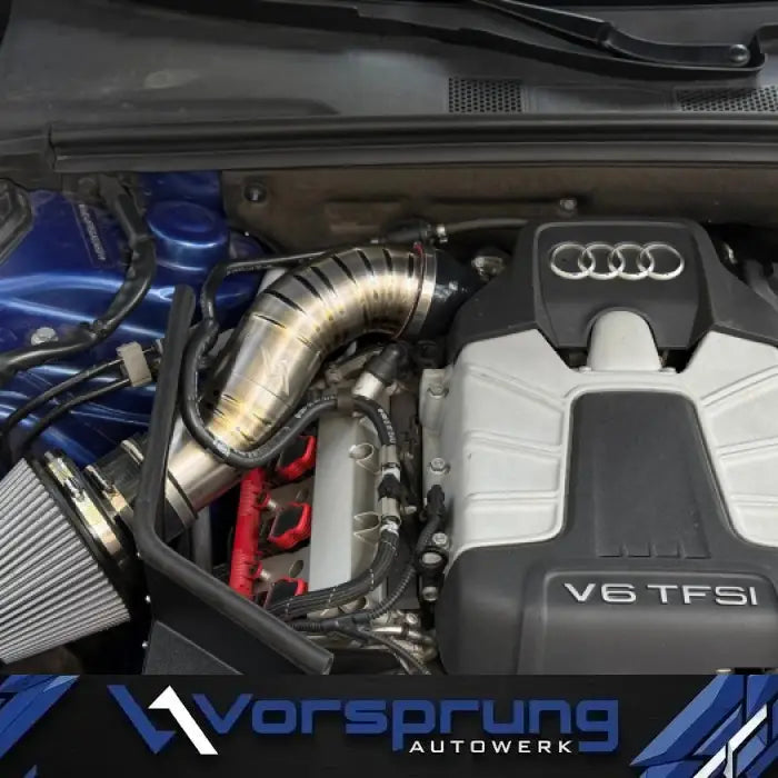 Titanium intake installed on Audi V6 TFSI engine in engine bay, performance air filter visible