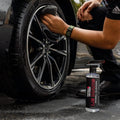 WASH & WHIPS Le Mans Wheel Cleaner in 16 oz bottle, designed for cleaning car wheels and rims effectively.