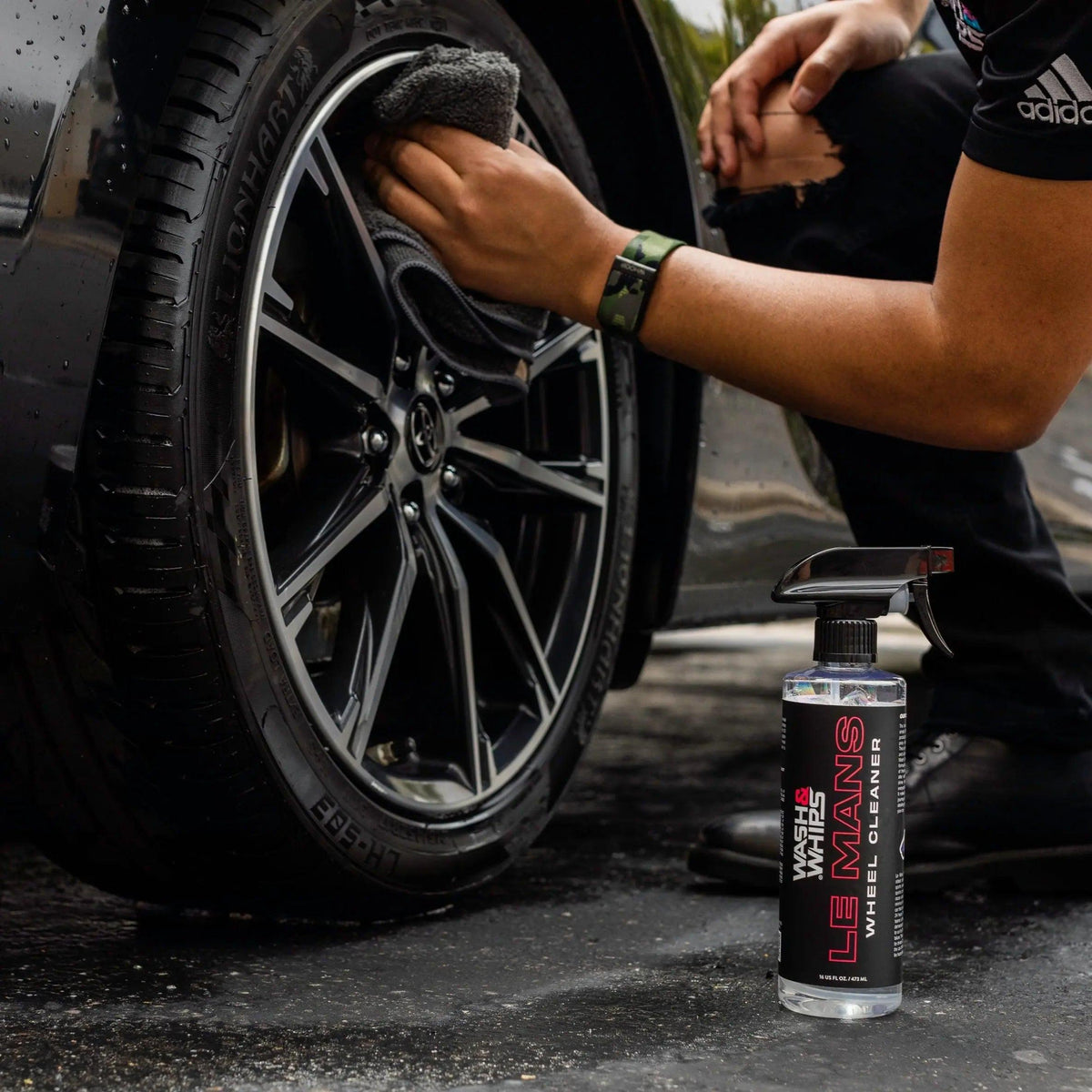 WASH & WHIPS Le Mans Wheel Cleaner in 16 oz bottle, designed for cleaning car wheels and rims effectively.