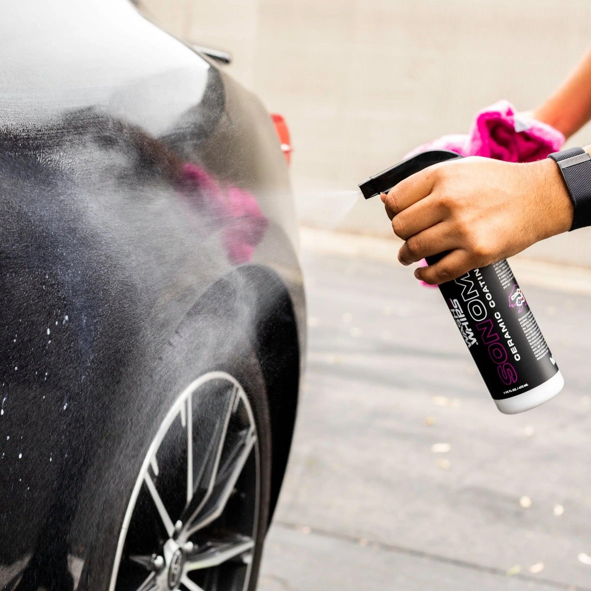 WASH & WHIPS SEAL exterior car seal and shine kit, step 3, showing application of sealant on a clean car exterior.