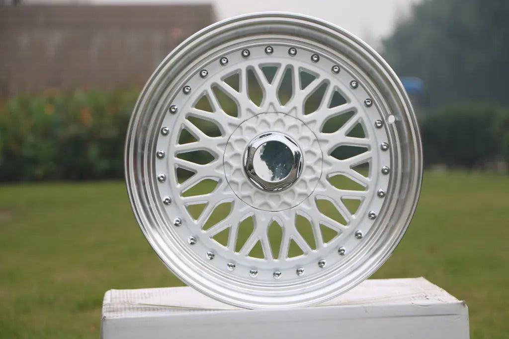 18-inch black BBS RS style wheels with 8-inch width and 5x112/5x114.3 bolt pattern, featuring a sleek multi-spoke design.