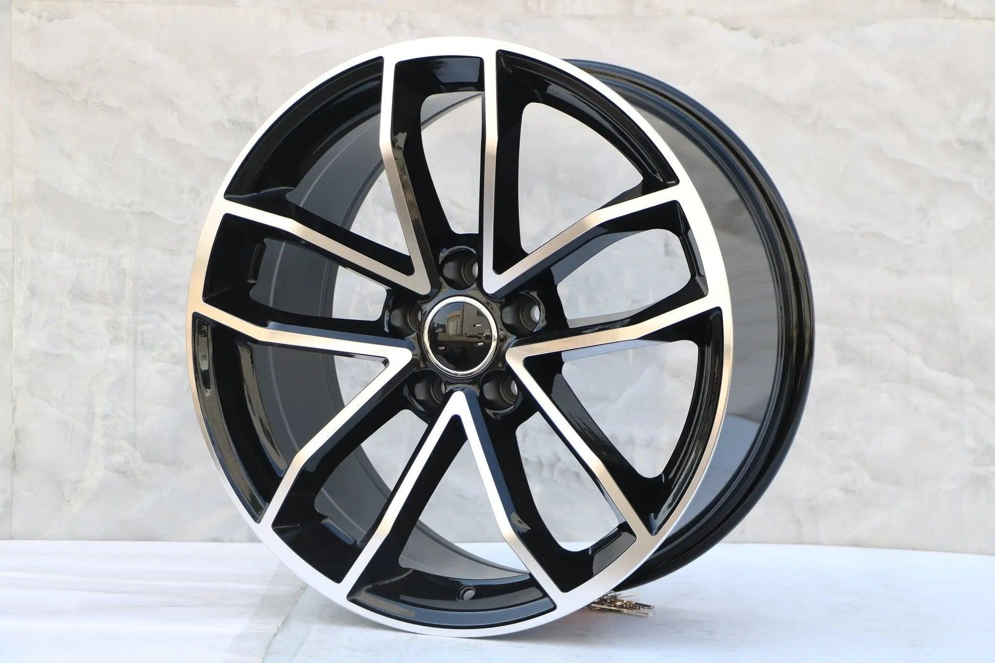 Black machined face 18-inch alloy wheel from WheeloutletNJ, fits Audi A3, A4, A5, A6, A7, A8, Q3, Q5, RS models, TT.