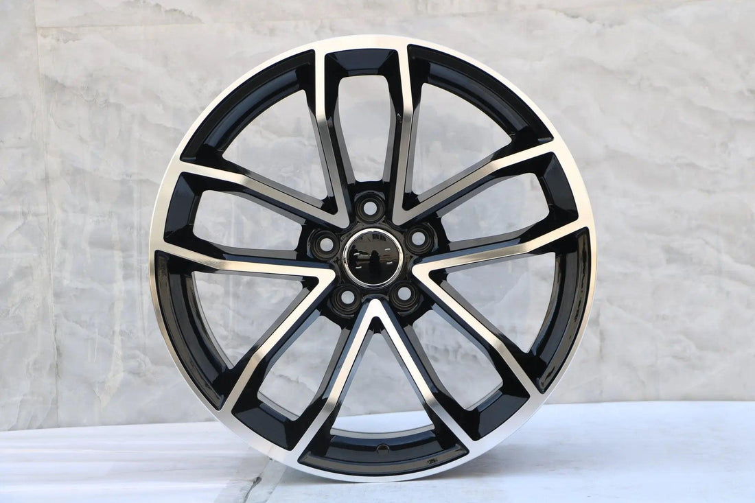 20-inch black machined face wheels by WheeloutletNJ for Audi A4, A5, Q5, S4, RS5, and other Audi models, shown with alloy design.