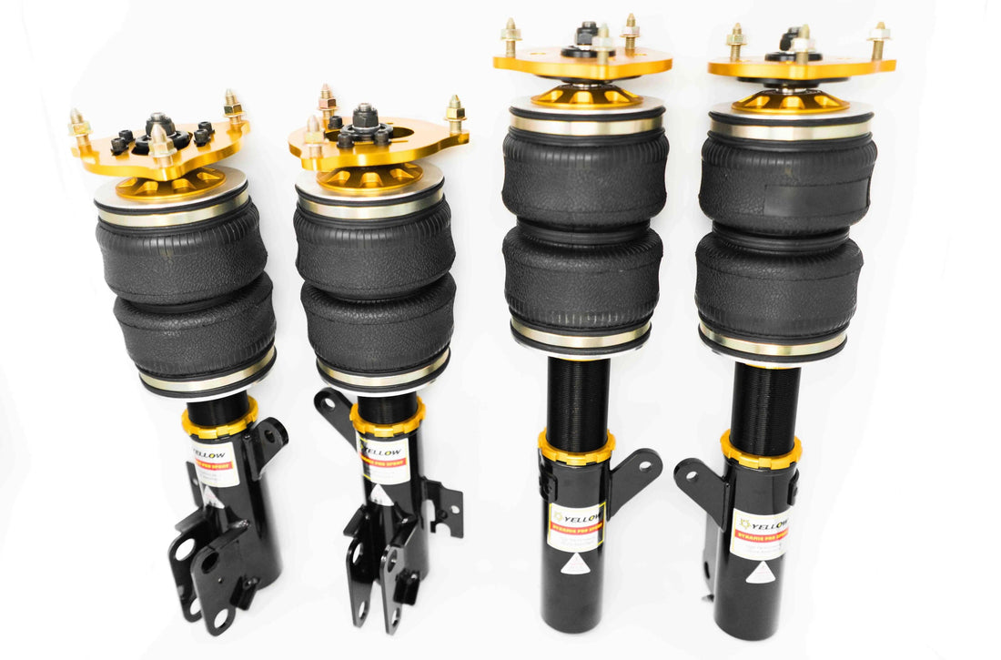 Yellow Speed Racing Dynamic Pro Air Struts for Audi TT Quattro 1998-2006 AWD, showing the yellow suspension components.