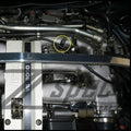 Polished stainless ZSPEC throttle cable clip for 1990-1996 Nissan 300ZX Z32, designed for secure throttle cable mounting.