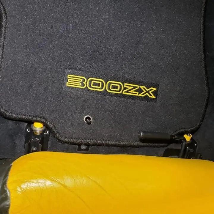 ZSPEC Dress Up Bolts stainless and billet seat fastener kit for 1990-1999 Nissan 300ZX Z32, showing blue fasteners and hardware components.
