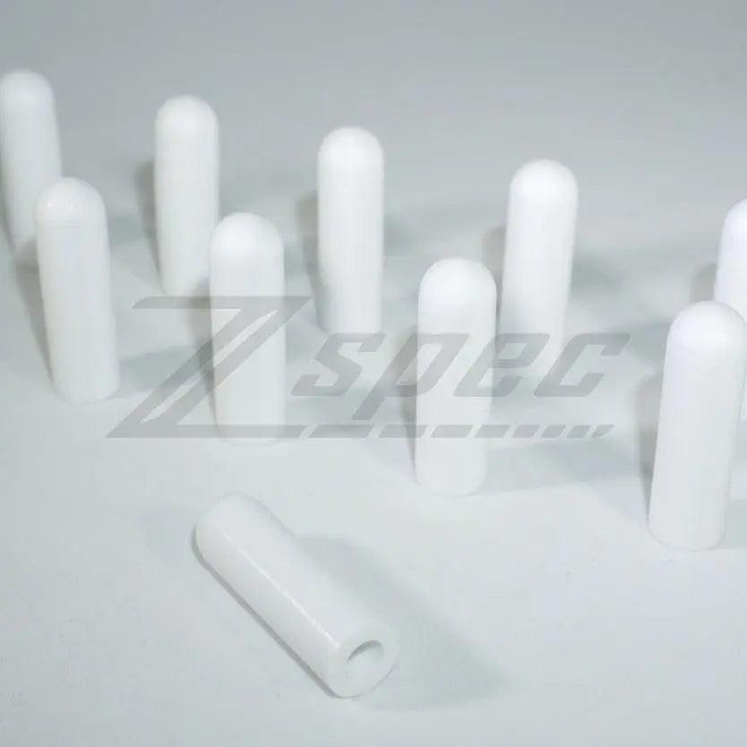 Orange silicone rubber T-bolt clamp sleeves and caps from ZSPEC Design, shown in a 10-pack, for dress-up and protective purposes.