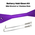Red billet ZSPEC battery hold down bracket with stainless hardware for Datsun Z and ZX cars, designed for secure engine bay mounting.