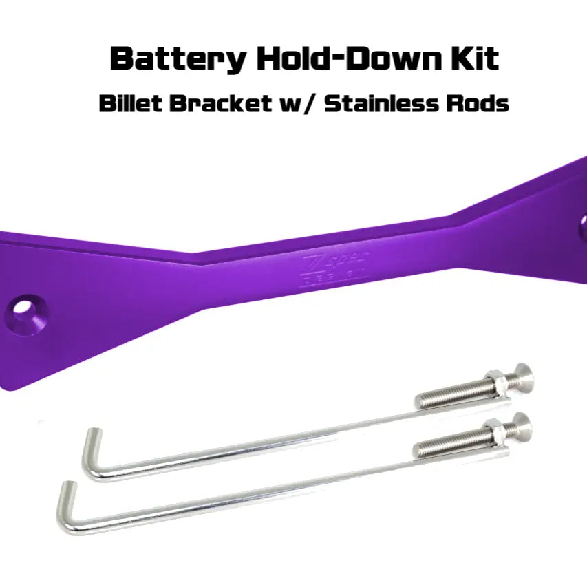 Red billet ZSPEC battery hold down bracket with stainless hardware for Datsun Z and ZX cars, designed for secure engine bay mounting.