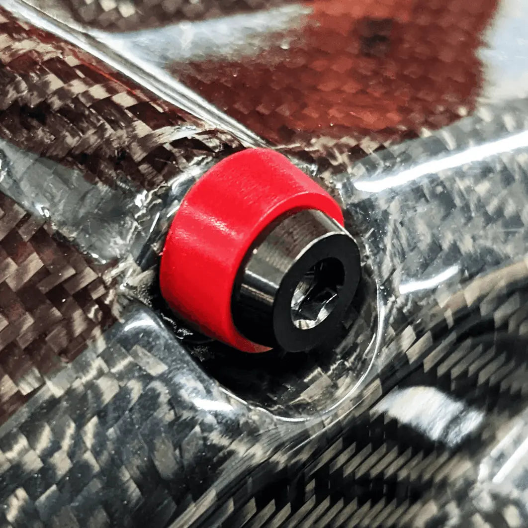 ZSPEC Titanium shoulder-bolt timing covers fasteners with red bushings for Nissan 300ZX Z32 engine, durable and lightweight.