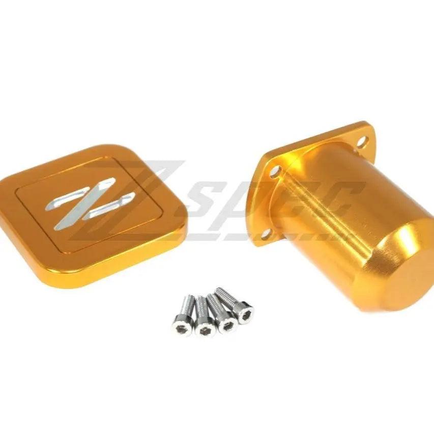 Silver ZSPEC Design cruise control cap covers for Nissan Z32 300ZX, billet aluminum with Z logo, for 1990-1996 models.