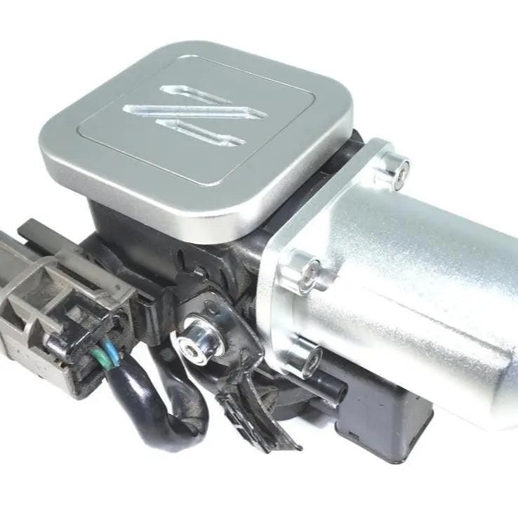 Silver ZSPEC Design billet aluminum cruise control cap covers for 1990-96 Nissan Z32 300ZX with Z logo visible.