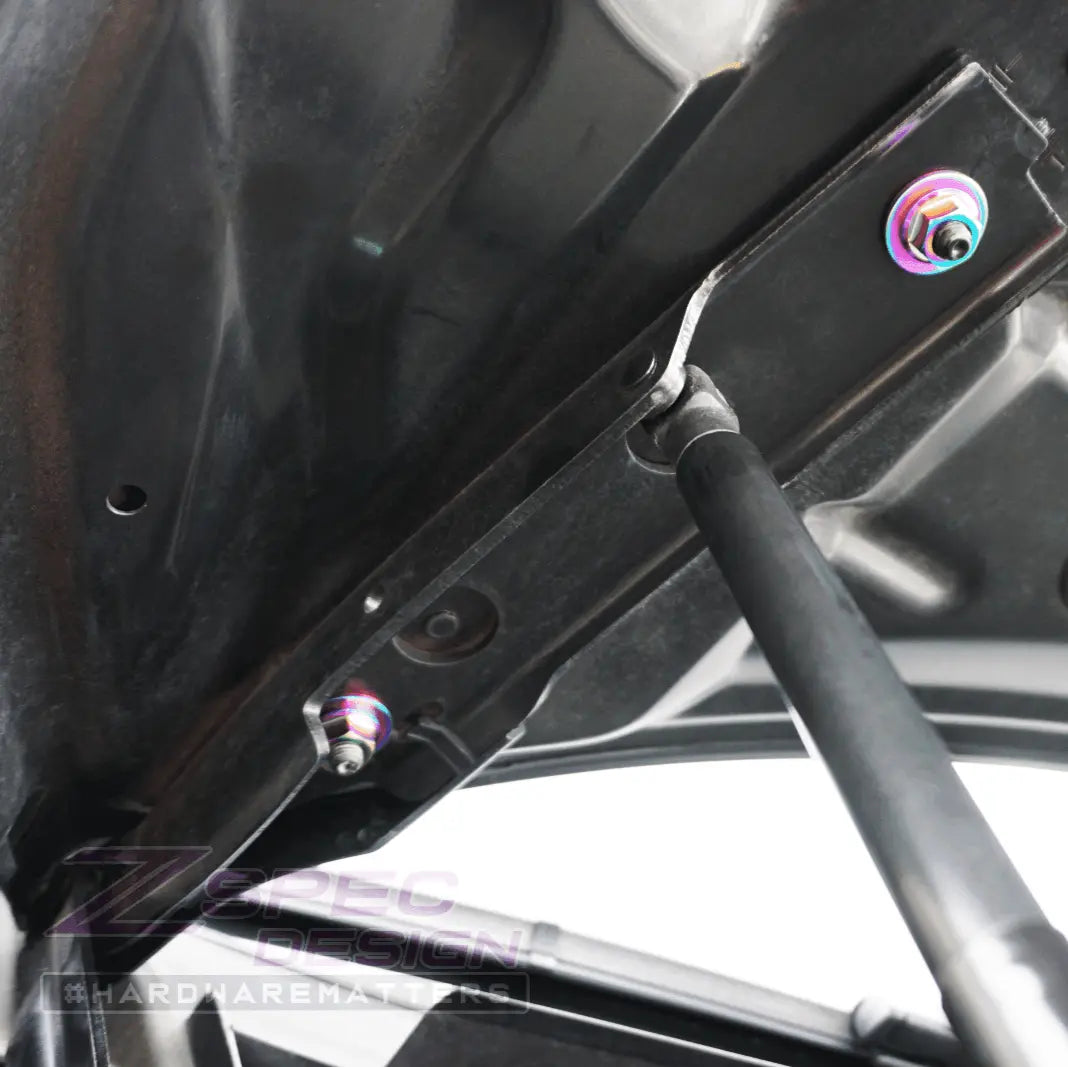 Silver ZSPEC M8-1.25 metric flare nut made of titanium Grade 5, designed for automotive or industrial use.